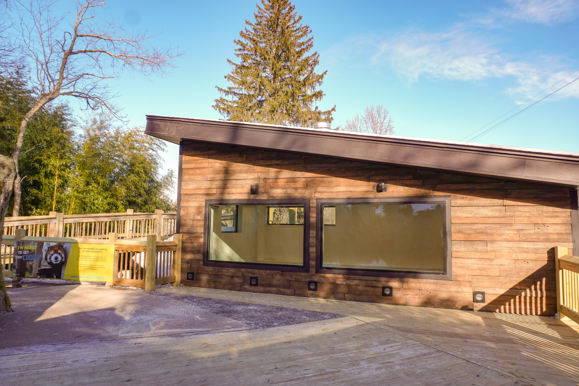 new red panda habitat building with double windows and large red panda signage